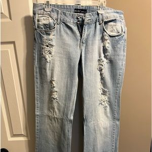Distressed flare denim jeans